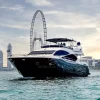 90 FT Sunseeker yacht cruising in Dubai Marina near Ain Dubai
