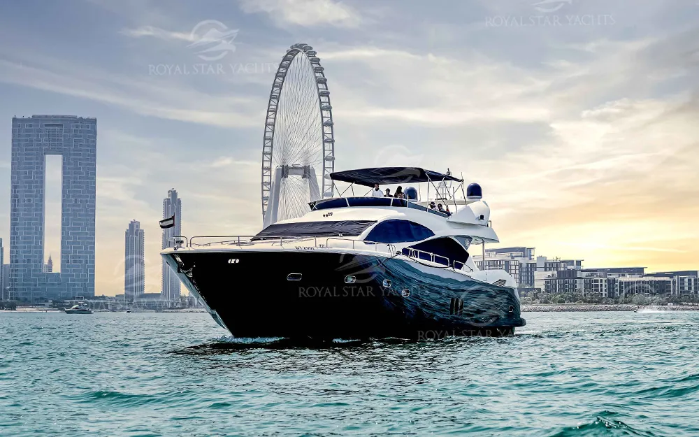 90 FT Sunseeker yacht cruising in Dubai Marina near Ain Dubai
