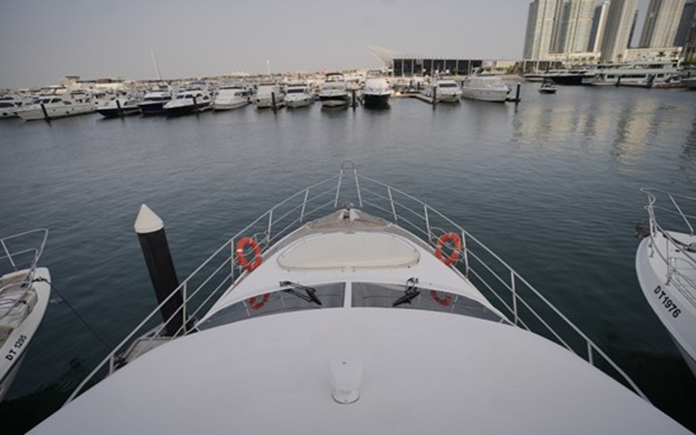 Front bow view of 75 FT Mayyas yacht docked in Dubai Marina