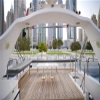 Upper deck seating and wooden flooring on 75 FT Mayyas yacht