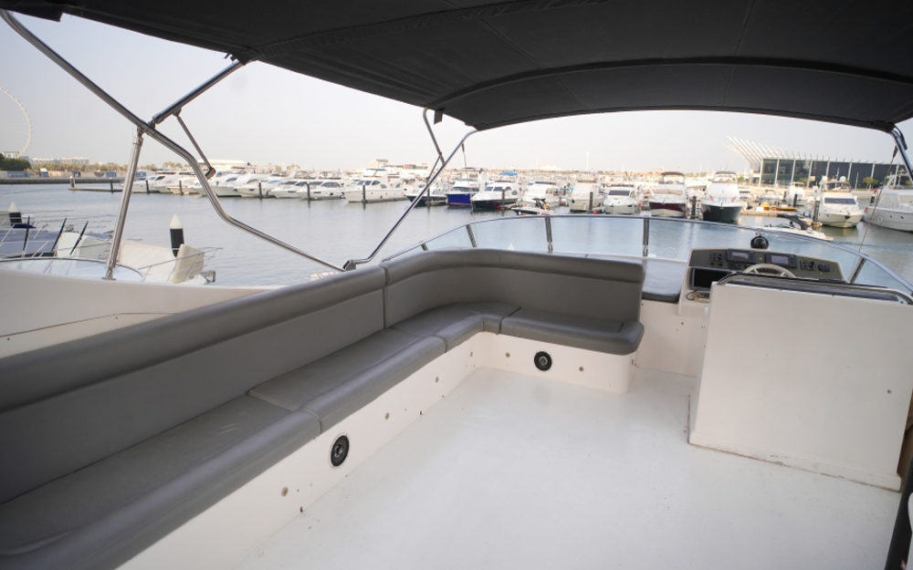 Upper deck seating with shaded canopy on 75 FT Mayyas yacht
