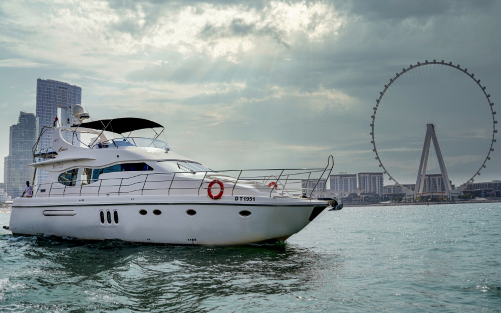 75 FT Mayyas yacht with Ain Dubai Ferris Wheel view at sunset