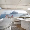 Dining space on 88 FT Majesty yacht deck.