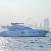 88 FT Majesty yacht with Dubai cityscape in background.