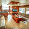 Elegant indoor salon with wooden finish on 90 FT Big Daddy yacht