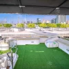 Outdoor flybridge deck with artificial grass on 90 FT Big Daddy yacht