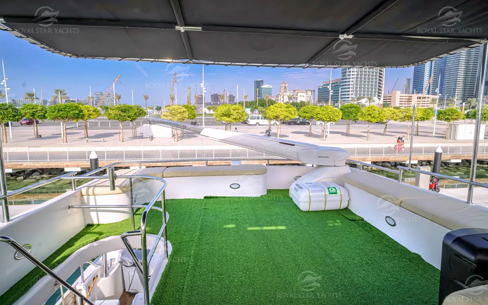 Outdoor flybridge deck with artificial grass on 90 FT Big Daddy yacht