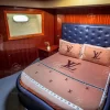 Luxury bedroom with premium bedding on 90 FT Big Daddy