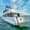Luxury mega yacht rear view with crew