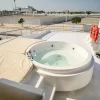 Jacuzzi and sunbathing area on deck of 101 FT Majesty yacht