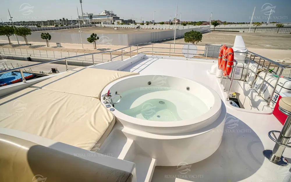 Jacuzzi and sunbathing area on deck of 101 FT Majesty yacht