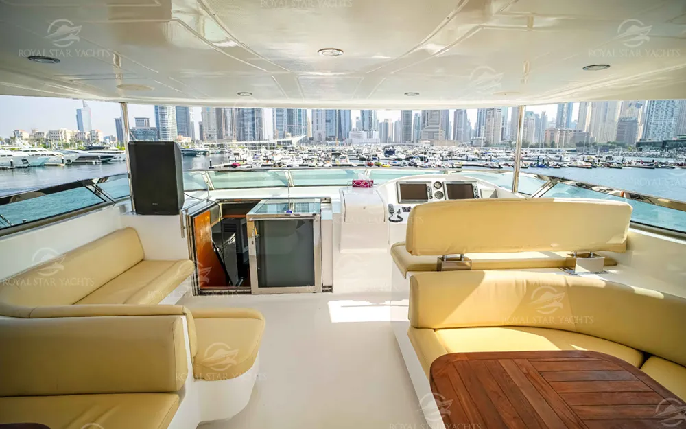 Outdoor seating and bar area on 101 FT Majesty yacht upper deck