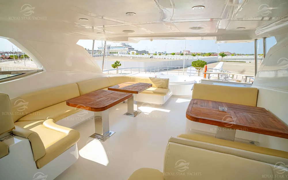 Spacious outdoor seating and dining space on 101 FT Majesty yacht