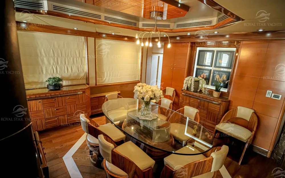 Elegant dining area with wooden finish inside 101 FT Majesty yacht