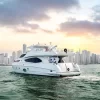 101 FT Majesty yacht cruising in Dubai Marina at sunset