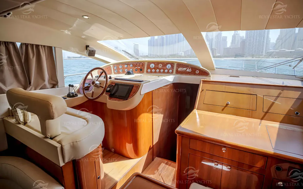 Rear deck seating with Dubai skyline view from Enterprise yacht