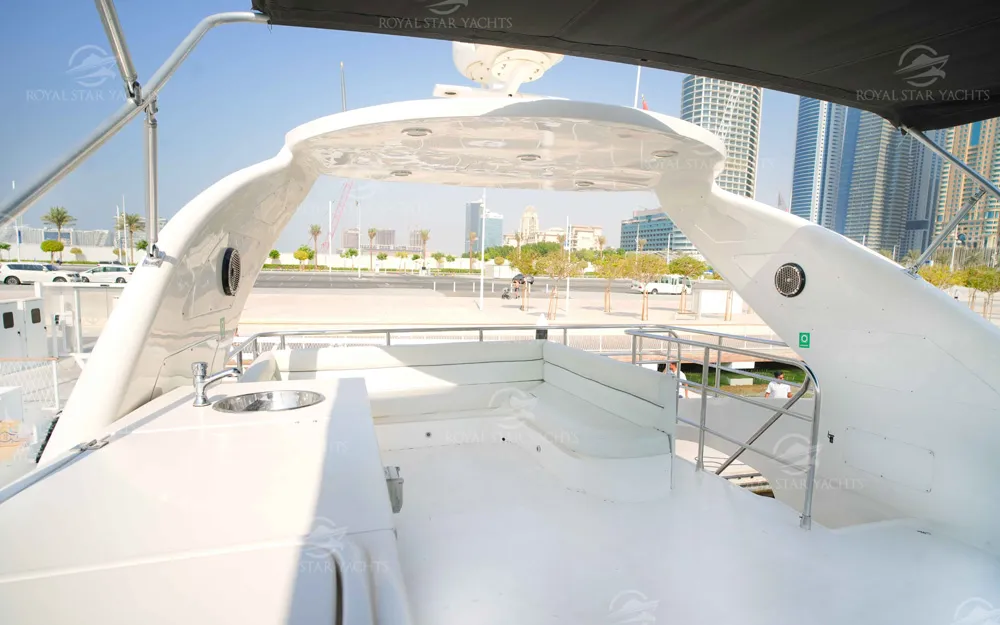Flybridge with sunbeds on 72 FT Superfly yacht