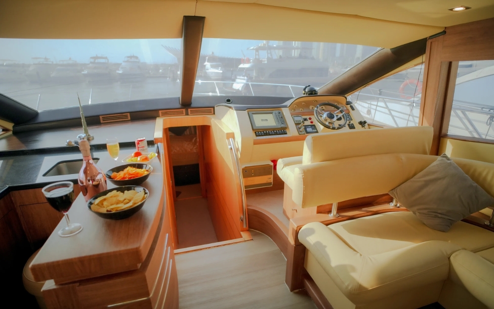 Cockpit dining space with drinks and snacks on Integrity yacht