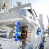 59 FT Majesty yacht rear view docked at Dubai Marina with balloons