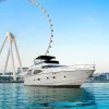 68 FT Luna yacht cruising near Ain Dubai wheel.