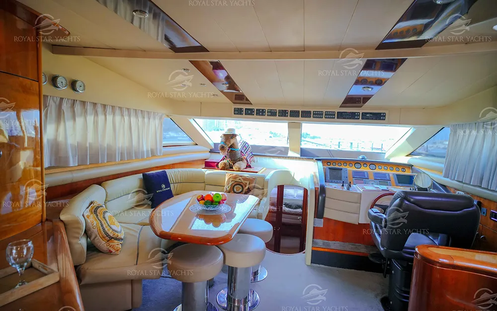 Indoor seating and dining area on 68 FT Luna yacht.