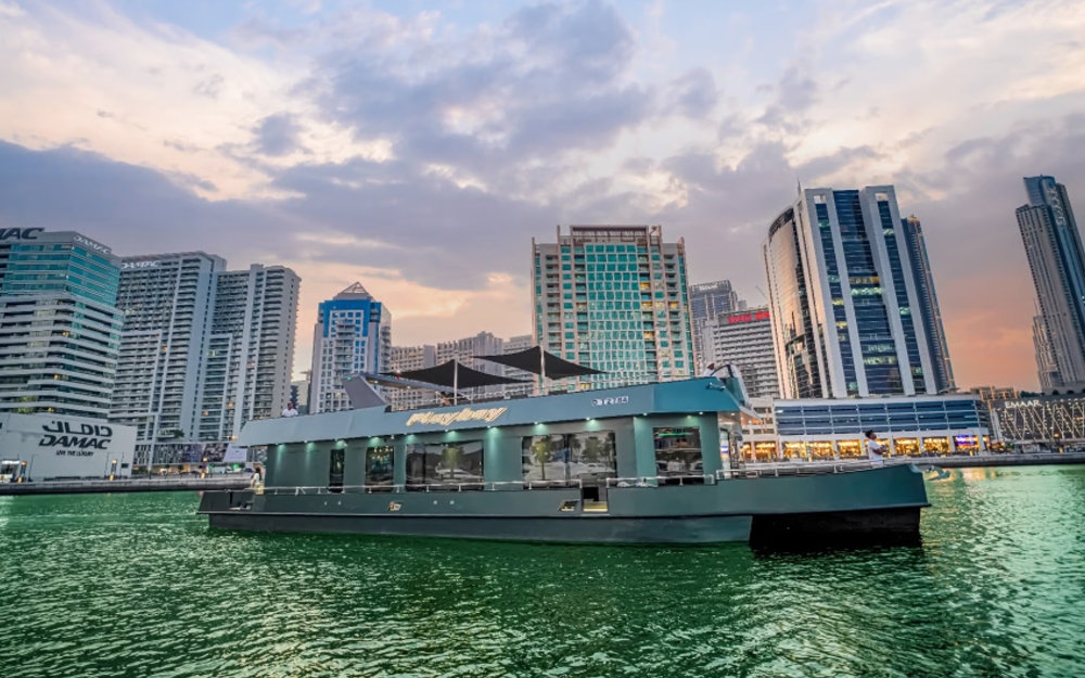 100 Ft Playboy yacht sailing in Dubai Marina