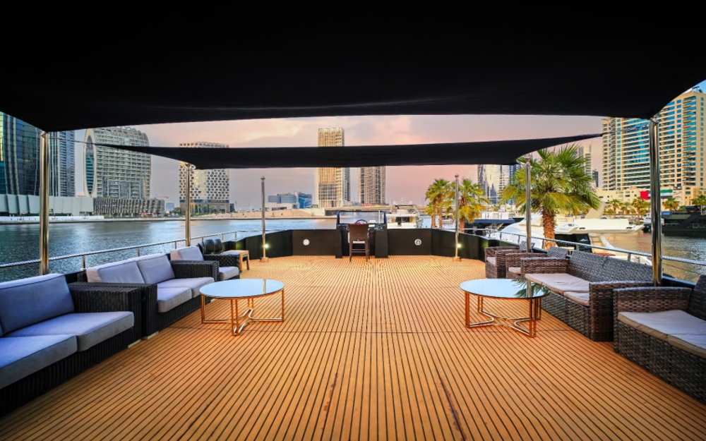 upper deck of Playboy yacht with lounge seating